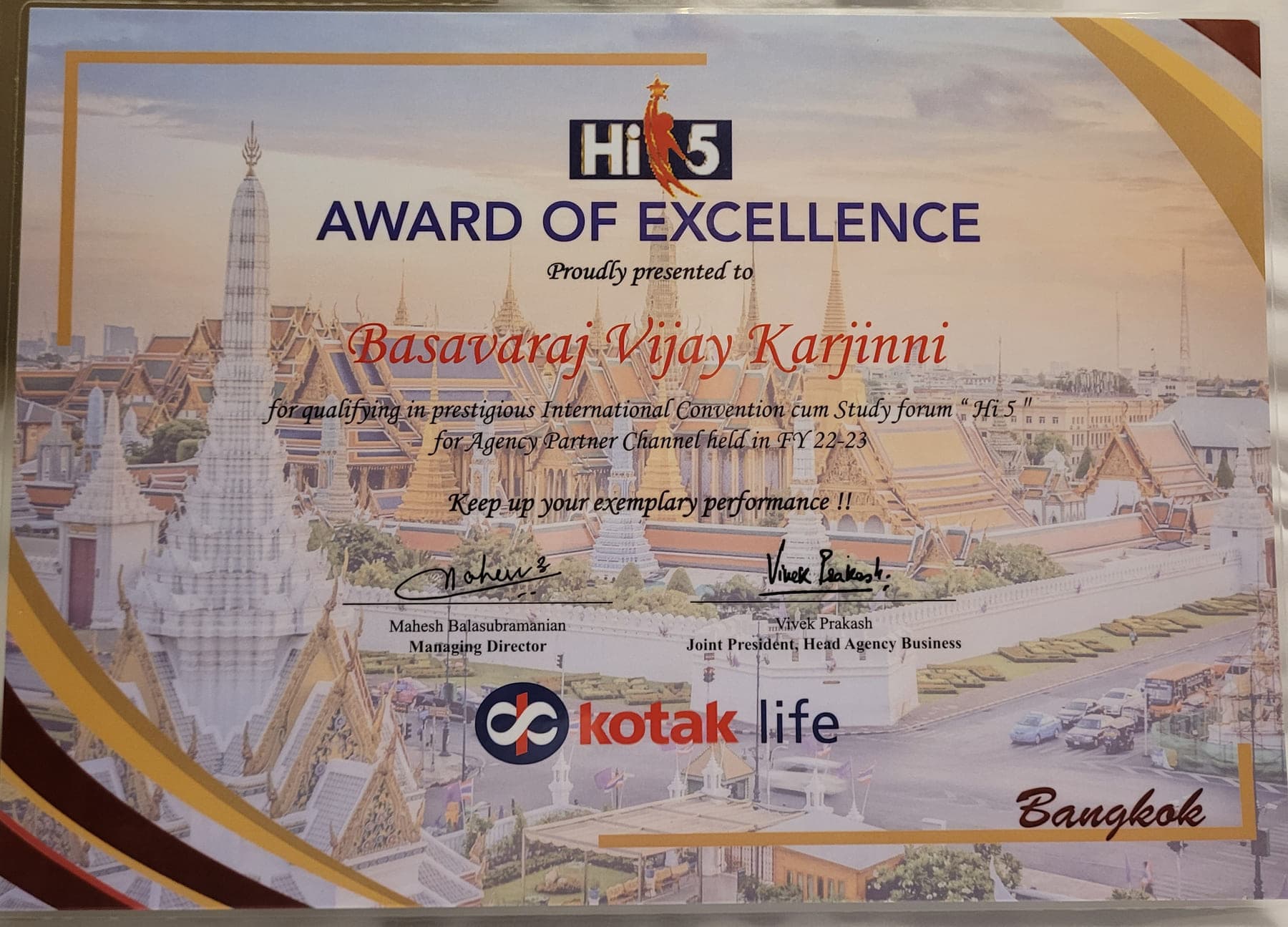 Kotak Life Hi 5 Award of Excellence presented to Basavaraj Vijay Karjinni for qualifying in the international convention cum study forum for the Agency Partner Channel, held in Bangkok.