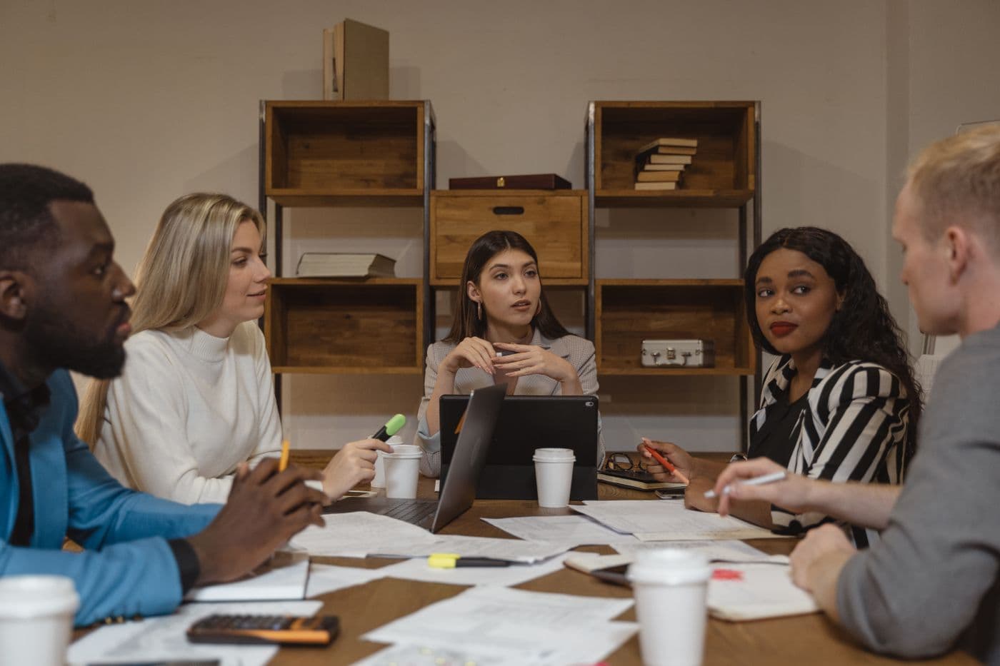 A team mapping out a plan around a table